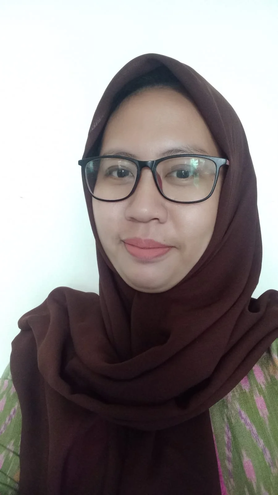 Dr. Dina Martha Fitri.,M.Pd
